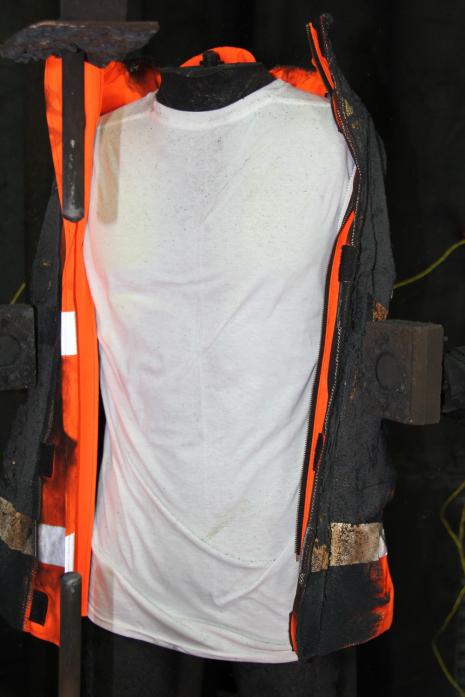 The T-shirt (thermal indicator) shows no indication of burn through the garment.