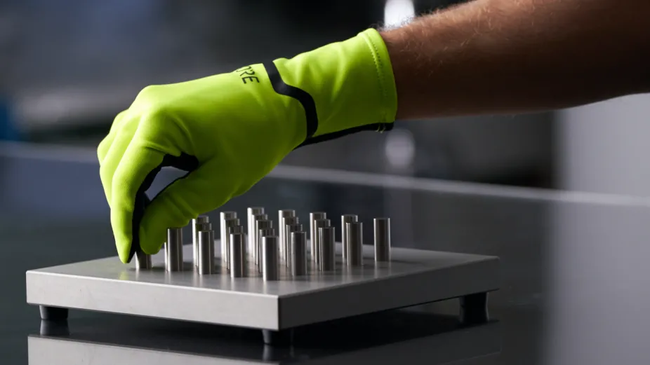 a close up shot of a hand wearing a Gore glove in a testing lab